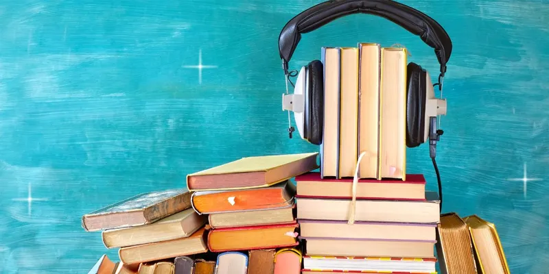 Kitap okurken müzik dinleyen okur ve kitap müzik eşleştirme atmosferi
